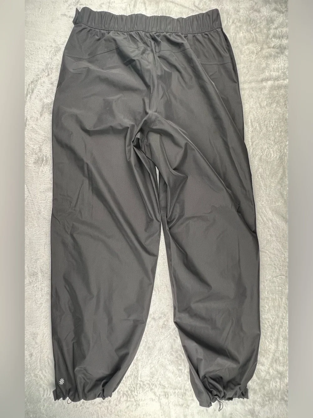 Athleta RainOut Traverse Pant Large Tall Black Zip Leg RAIN PANTS Running Hike